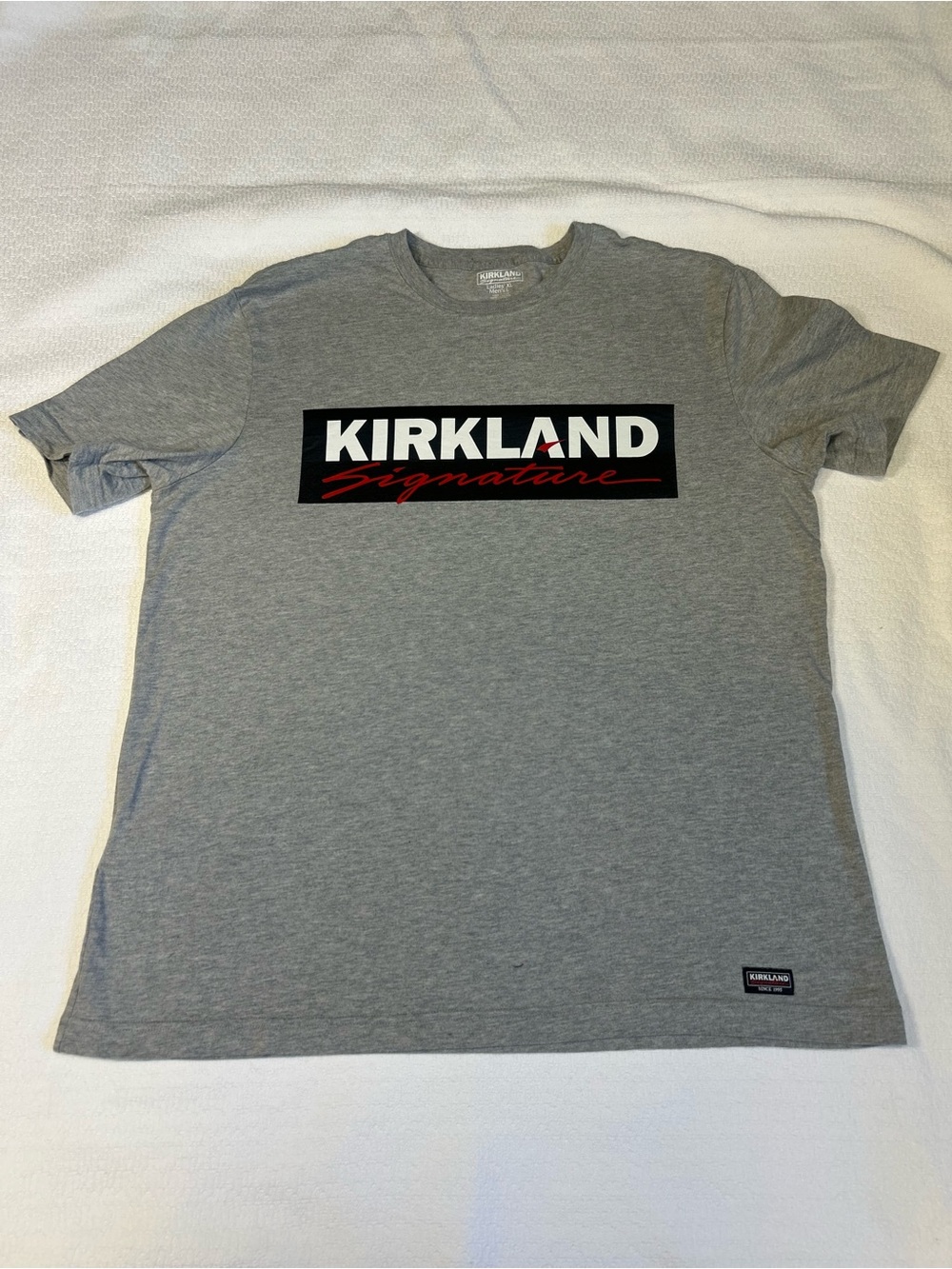 Kirkland Signature Logo T Shirt Mens L Womens XL Gray Short Sleeve Graphic Tee